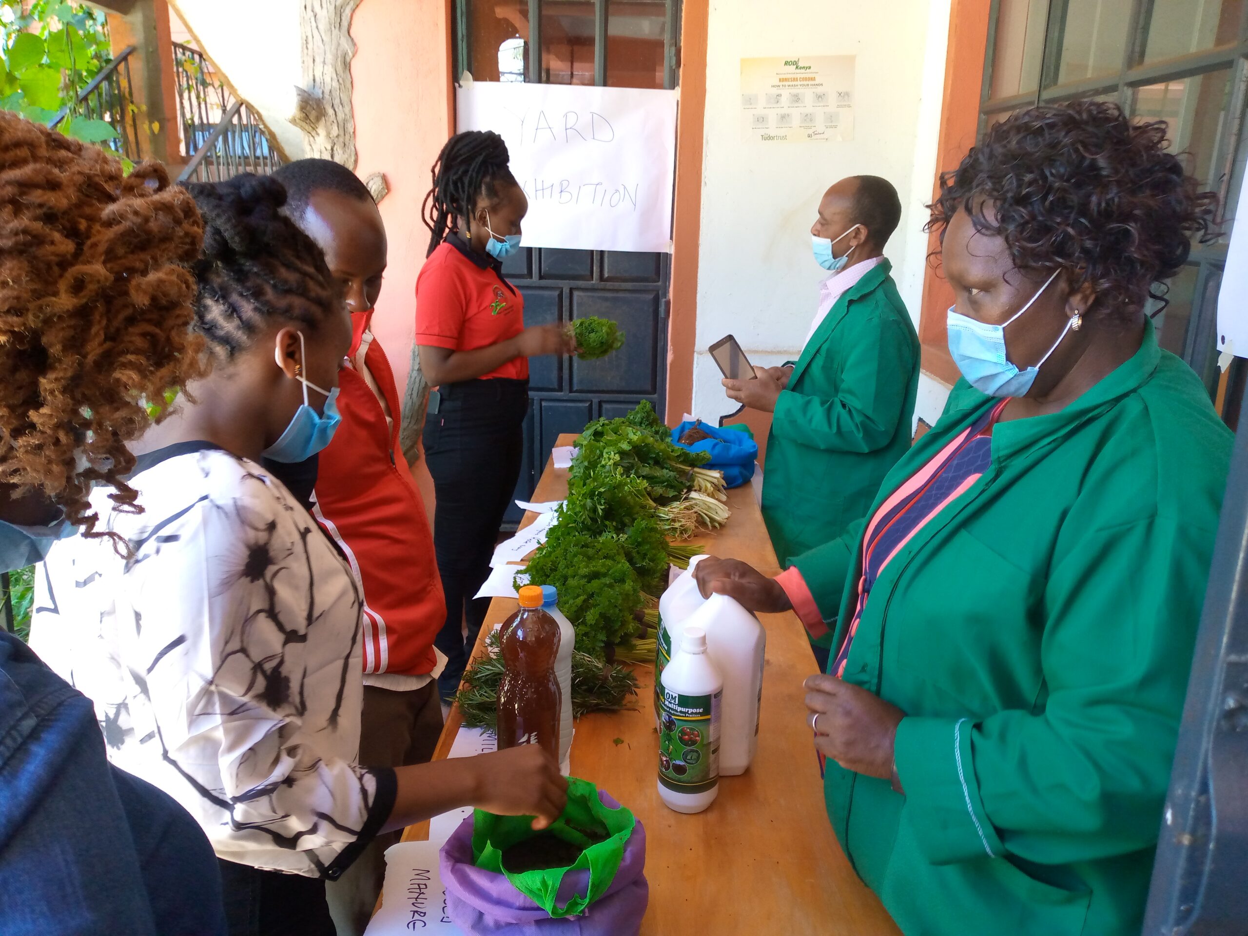 OACK Farmer showcasing her products during the 2020 World Soil Day Celebrations